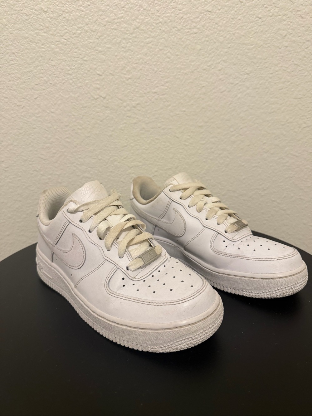 Women’s Nike Air Force 1s White Leather Low-Top Sneakers